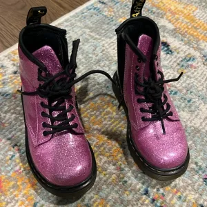 Sparkle pink Dr Martens boots. Excellent used condition.